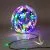 Colorful LED string lights on a spool, perfect for festive decorations and ambiance creation. Ideal for indoor and outdoor use.